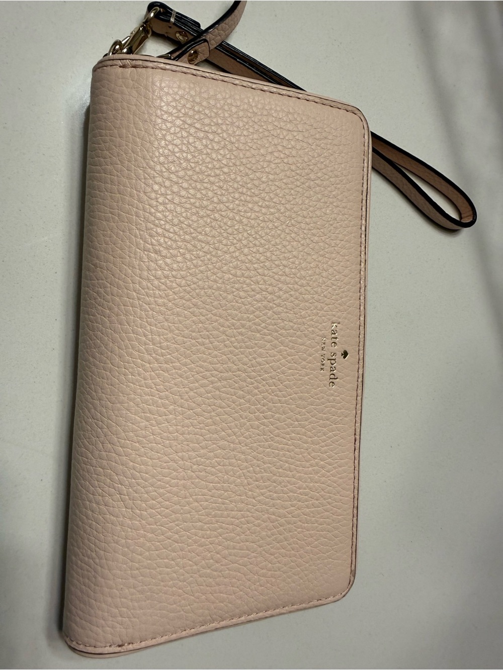 kate spade Pebbled Leather Wristlet in Blush Pink
